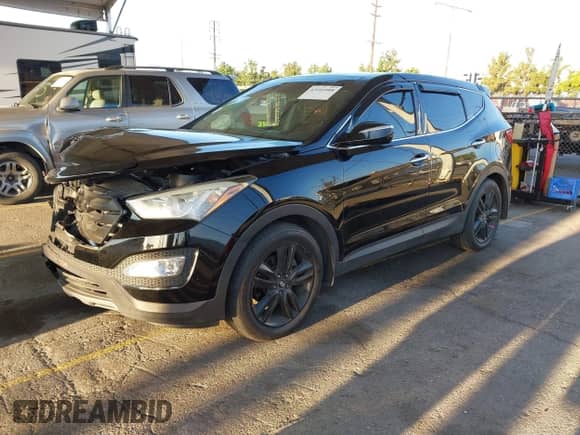 2013 Hyundai Santa Fe Sport with VIN 5XYZW3LA1DG019765, listed as a IAAI auction lot 43101008 with 136,535 mi miles and . Bid and sale history available at DreamBid. Image 2.