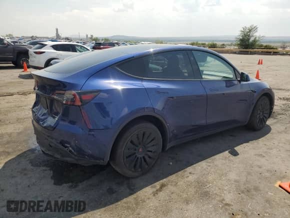 2023 Tesla Model Y Long Range with VIN 7SAYGDEE3PA152537, listed as a Copart auction lot 64859715 with Not provided miles and Salvage title. Bid and sale history available at DreamBid. Image 3.