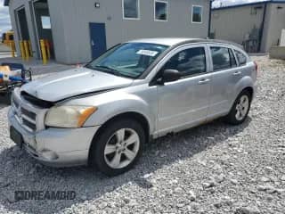 2011 Dodge Caliber Mainstreet with VIN 1B3CB3HA1BD298643, listed as a Copart auction lot 70346555 with 157,144 mi miles and Salvage title. Bid and sale history available at DreamBid. Image 1.