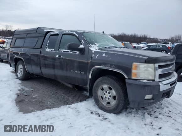 2011 Chevrolet Silverado 1500 LT with VIN 1GCRKSE07BZ204475, listed as a Copart auction lot 86148784 with 77,319 mi miles and Salvage title. Bid and sale history available at DreamBid. Image 4.