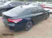 2020 Toyota Camry SE with VIN 4T1G11AK4LU955992, listed as a IAAI auction lot 43027088 with 77,002 mi miles and . Bid and sale history available at DreamBid. Image 4.