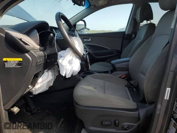 2015 Hyundai Santa Fe with VIN 5XYZUDLB0FG279064, listed as a Copart auction lot 63467345 with 69,935 mi miles and Salvage title. Bid and sale history available at DreamBid. Image 7.