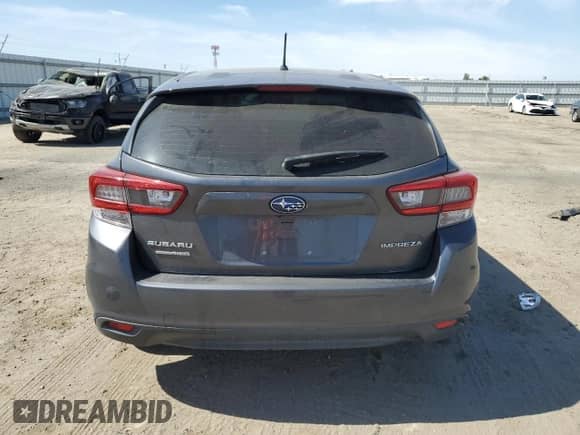 2020 Subaru Impreza с VIN 4S3GTAA62L1733731, выставлен на аукционе Copart как лот 56933785 с пробегом 74 424 миль миль и Списание • Salvage title. История ставок и продаж доступна на DreamBid. Изображение 6.