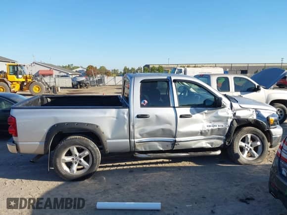 2007 Dodge 1500 SLT with VIN 1D7HU18257S227305, listed as a IAAI auction lot 43344423 with 200,951 mi miles and . Bid and sale history available at DreamBid. Image 13.