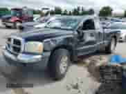 2005 Dodge Dakota SLT with VIN 1D7HW42N65S110862, listed as a Copart auction lot 64980665 with Not provided miles and Salvage title. Bid and sale history available at DreamBid. Image 1.