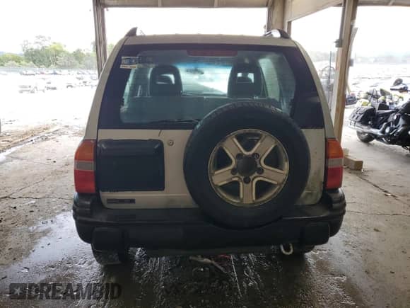 2003 Chevrolet Tracker with VIN 2CNBJ13C736952177, listed as a Copart auction lot 69860185 with 282,707 mi miles and Clean title. Bid and sale history available at DreamBid. Image 6.