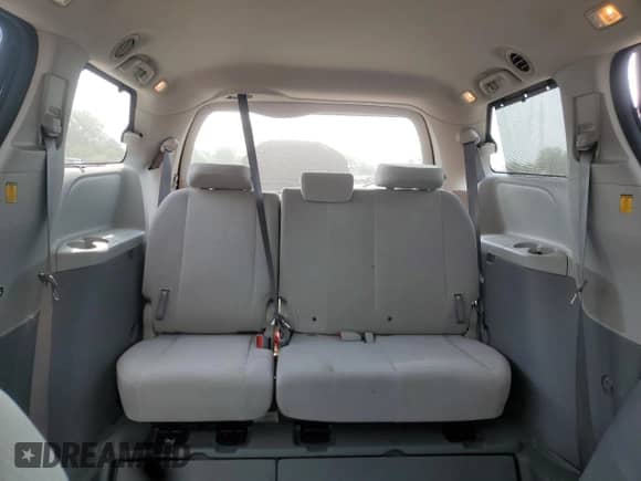 2013 Toyota Sienna LE AAS с VIN 5TDKK3DC6DS305613, выставлен на аукционе Copart как лот 66013225 с пробегом 87 778 миль миль и Списание • Salvage title. История ставок и продаж доступна на DreamBid. Изображение 10.