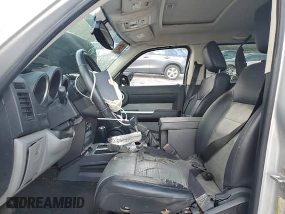 2007 Dodge Nitro SLT z VIN 1D8GT58K97W619567, wystawiony jako Copart lot #71322465 z przebiegiem 234 159 mil mil oraz Szkoda całkowita • Salvage title. Historia ofert i sprzedaży dostępna na DreamBid. Obrazek 7.