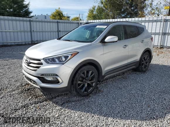 2018 Hyundai Santa Fe 2.0T с VIN 5XYZUDLA7JG557507, выставлен на аукционе Copart как лот 84480945 с пробегом 106 770 миль миль и Чистый • Clean title. История ставок и продаж доступна на DreamBid. Изображение 1.