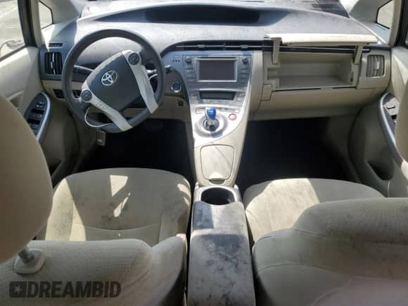 2015 Toyota Prius Four z VIN JTDKN3DUXF0405865, wystawiony jako Copart lot #81977625 z przebiegiem Nie podano mil oraz Szkoda całkowita • Salvage title. Historia ofert i sprzedaży dostępna na DreamBid. Obrazek 8.