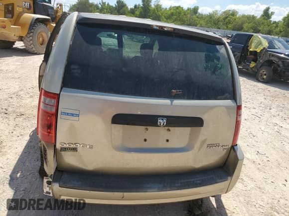 2009 Dodge Grand Caravan SE with VIN 2D8HN44E19R659128, listed as a Copart auction lot 69866175 with Not provided miles and Salvage title. Bid and sale history available at DreamBid. Image 6.