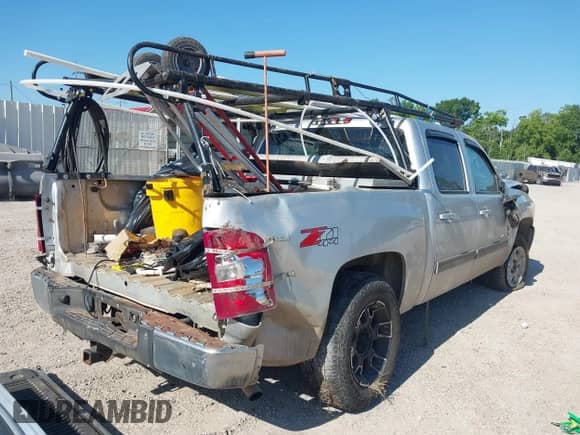 2013 Chevrolet Silverado 1500 LT with VIN 3GCPKSE79DG243009, listed as a IAAI auction lot 42230154 with Not provided miles and . Bid and sale history available at DreamBid. Image 6.