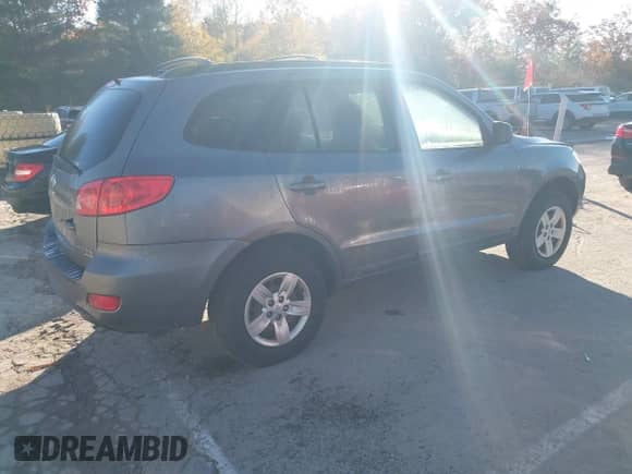 2009 Hyundai Santa Fe GLS z VIN 5NMSG73D69H300151, wystawiony jako IAAI lot #43537665 z przebiegiem 127 101 mil mil oraz . Historia ofert i sprzedaży dostępna na DreamBid. Obrazek 4.