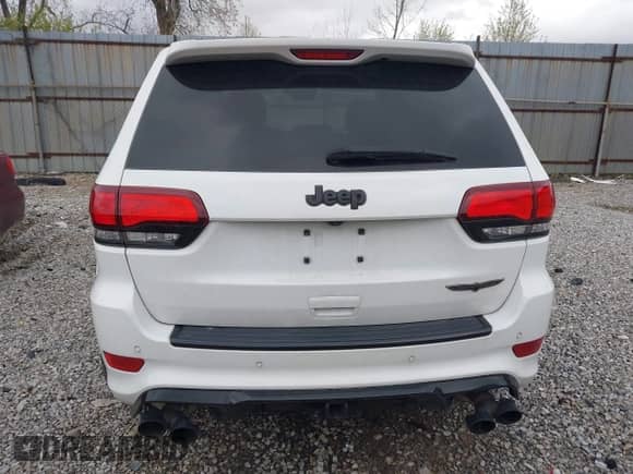 2018 Jeep Grand Cherokee Trackhawk z VIN 1C4RJFN96JC293787, wystawiony jako IAAI lot #39122517 z przebiegiem 69 781 mil mil oraz . Historia ofert i sprzedaży dostępna na DreamBid. Obrazek 16.