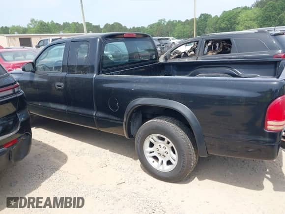 2003 Dodge Dakota with VIN 1D7HL12X73S381323, listed as a IAAI auction lot 42161329 with 219,083 mi miles and . Bid and sale history available at DreamBid. Image 13.