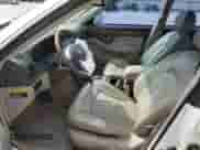 2005 Hyundai XG с VIN KMHFU45E65A417601, выставлен на аукционе Copart как лот 68658414 с пробегом 242 348 миль миль и Списание • Salvage title. История ставок и продаж доступна на DreamBid. Изображение 7.