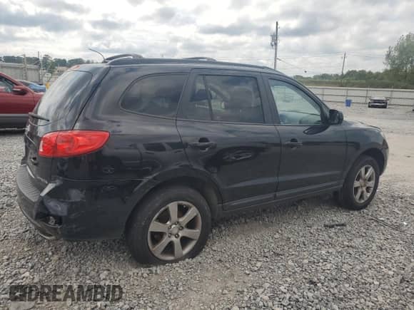 2009 Hyundai Santa Fe Limited с VIN 5NMSH13E69H304395, выставлен на аукционе Copart как лот 70064874 с пробегом 133 028 миль миль и Чистый • Clean title. История ставок и продаж доступна на DreamBid. Изображение 3.