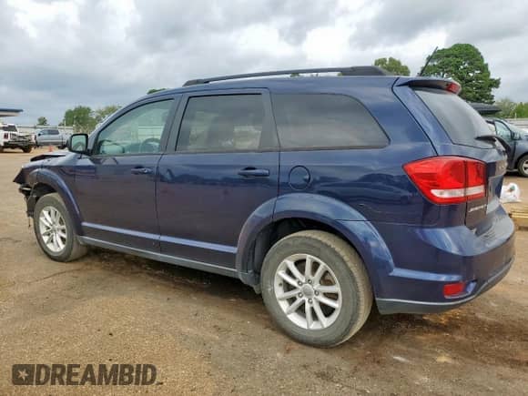 2017 Dodge Journey SXT with VIN 3C4PDCBB2HT577419, listed as a Copart auction lot 82141965 with 121,779 mi miles and Salvage title. Bid and sale history available at DreamBid. Image 2.