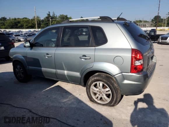 2007 Hyundai Tucson SE with VIN KM8JN12D57U486637, listed as a Copart auction lot 64094735 with 158,509 mi miles and Non repairable. Bid and sale history available at DreamBid. Image 2.
