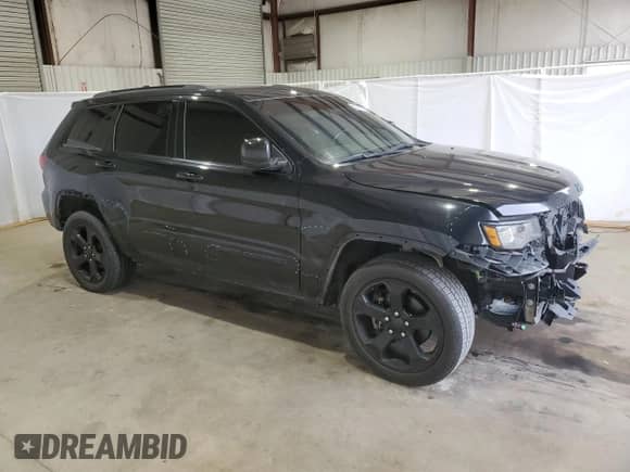 2020 Jeep Grand Cherokee Laredo E with VIN 1C4RJEAG6LC248513, listed as a Copart auction lot 88086575 with 115,371 mi miles and Salvage title. Bid and sale history available at DreamBid. Image 4.
