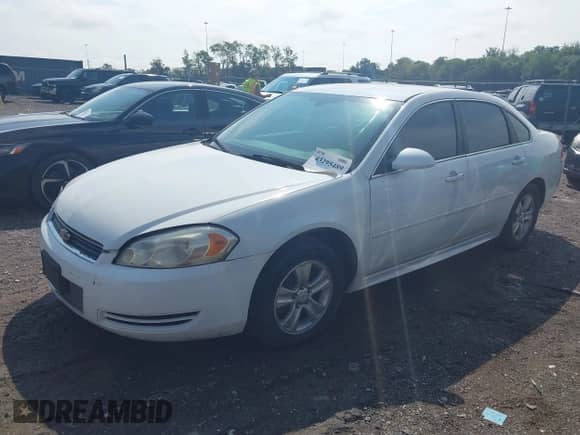 2012 Chevrolet Impala LS Fleet with VIN 2G1WF5E33C1326627, listed as a IAAI auction lot 43295489 with 106,773 mi miles and . Bid and sale history available at DreamBid. Image 2.