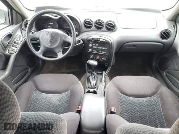 2004 Pontiac Grand Am SE with VIN 1G2NE52F04M573148, listed as a Copart auction lot 58763885 with 160,559 mi miles and Salvage title. Bid and sale history available at DreamBid. Image 8.