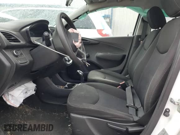 2020 Chevrolet Spark LS z VIN KL8CB6SAXLC460424, wystawiony jako Copart lot #69800585 z przebiegiem Nie podano mil oraz Szkoda całkowita • Salvage title. Historia ofert i sprzedaży dostępna na DreamBid. Obrazek 7.
