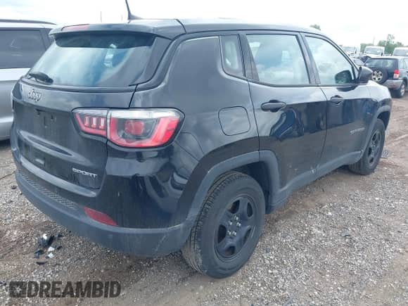 2018 Jeep Compass Sport with VIN 3C4NJCAB2JT187010, listed as a IAAI auction lot 42607545 with 94,715 mi miles and . Bid and sale history available at DreamBid. Image 4.