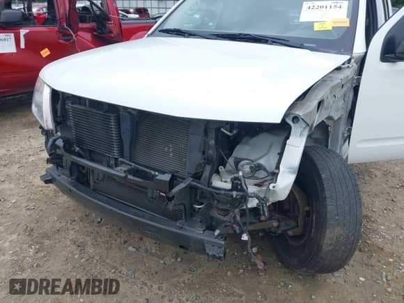 2014 Nissan Frontier S with VIN 1N6BD0CT6EN761092, listed as a IAAI auction lot 42201154 with 142,271 mi miles and . Bid and sale history available at DreamBid. Image 6.