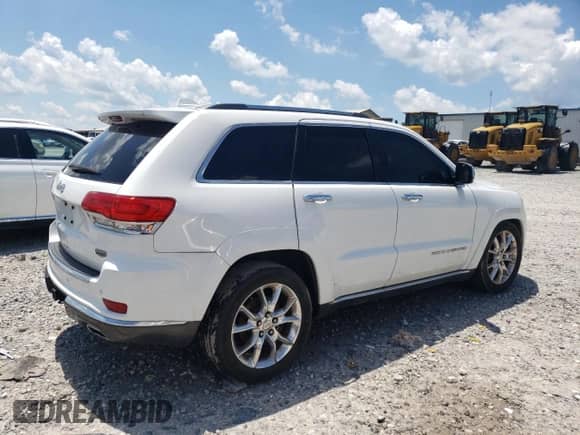 2015 Jeep Grand Cherokee Summit с VIN 1C4RJFJM0FC128965, выставлен на аукционе Copart как лот 63041525 с пробегом 179 500 миль миль и Чистый • Clean title. История ставок и продаж доступна на DreamBid. Изображение 3.