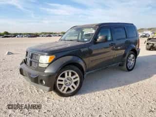 2011 Dodge Nitro Heat with VIN 1D4PT4GK9BW570618, listed as a Copart auction lot 84421505 with 76,339 mi miles and Salvage title. Bid and sale history available at DreamBid. Image 1.