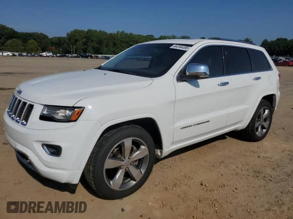 2015 Jeep Grand Cherokee Overland with VIN 1C4RJECG2FC614713, listed as a Copart auction lot 66356495 with 164,832 mi miles and Salvage title. Bid and sale history available at DreamBid. Image 1.