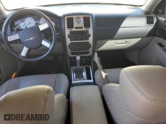 2006 Chrysler 300 C with VIN 2C3KA63H76H417831, listed as a Copart auction lot 71081355 with 115,408 mi miles and Salvage title. Bid and sale history available at DreamBid. Image 8.