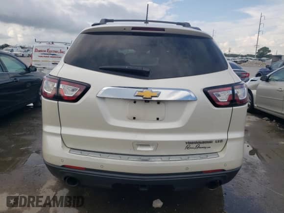 2013 Chevrolet Traverse LTZ с VIN 1GNKRLKD5DJ226087, выставлен на аукционе Copart как лот 67785215 с пробегом 168 419 миль миль и Списание • Salvage title. История ставок и продаж доступна на DreamBid. Изображение 6.