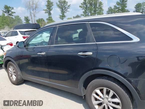 2017 Kia Sorento LX with VIN 5XYPG4A57HG188033, listed as a IAAI auction lot 43036335 with 178,186 mi miles and . Bid and sale history available at DreamBid. Image 14.