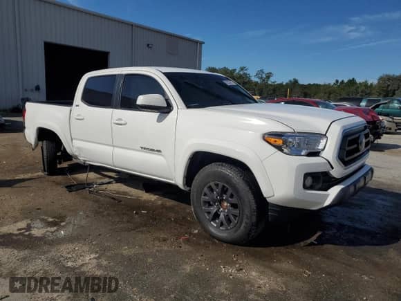 2023 Toyota Tacoma SR5 z VIN 3TMAZ5CN4PM217525, wystawiony jako Copart lot #82028615 z przebiegiem 22 100 mil mil oraz Szkoda całkowita • Salvage title. Historia ofert i sprzedaży dostępna na DreamBid. Obrazek 4.