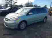 2009 Toyota Sienna XLE with VIN 5TDZK22C39S264912, listed as a IAAI auction lot 43385734 with 327,786 mi miles and . Bid and sale history available at DreamBid. Image 2.