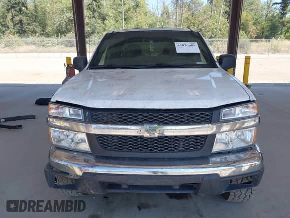 2007 Chevrolet Colorado 2LT z VIN 1GCCS13E478105348, wystawiony jako IAAI lot #42820005 z przebiegiem 157 641 mil mil oraz . Historia ofert i sprzedaży dostępna na DreamBid. Obrazek 13.