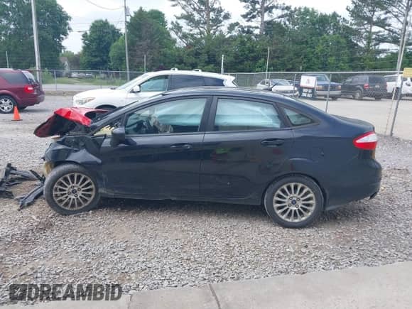 2014 Ford Fiesta S with VIN 3FADP4AJ8EM201618, listed as a IAAI auction lot 42234592 with 170,203 mi miles and . Bid and sale history available at DreamBid. Image 15.