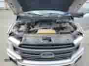 2018 Ford F-150 XLT z VIN 1FTEW1EG5JFA84380, wystawiony jako Copart lot #54830565 z przebiegiem 141 764 mil mil oraz Szkoda całkowita • Salvage title. Historia ofert i sprzedaży dostępna na DreamBid. Obrazek 11.