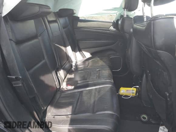 2018 Jeep Grand Cherokee Overland with VIN 1C4RJFCT1JC314558, listed as a IAAI auction lot 42206305 with 83,570 mi miles and . Bid and sale history available at DreamBid. Image 8.