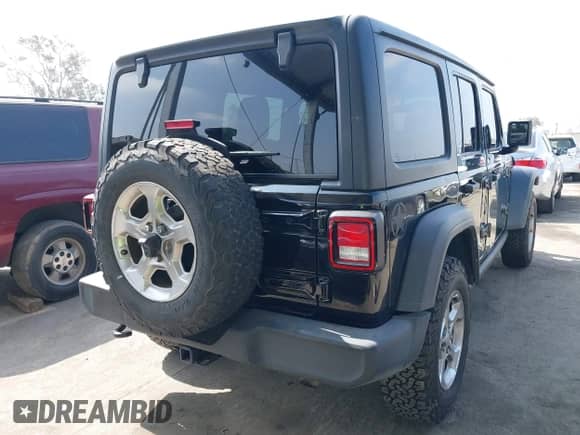 2021 Jeep Wrangler Unlimited Sport Altitude with VIN 1C4HJXDN5MW670810, listed as a IAAI auction lot 42562339 with 136,697 mi miles and . Bid and sale history available at DreamBid. Image 4.