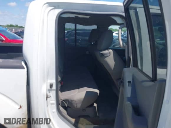 2013 Nissan Frontier SL with VIN 1N6AD0ER9DN733864, listed as a IAAI auction lot 42167431 with 114,299 mi miles and . Bid and sale history available at DreamBid. Image 8.