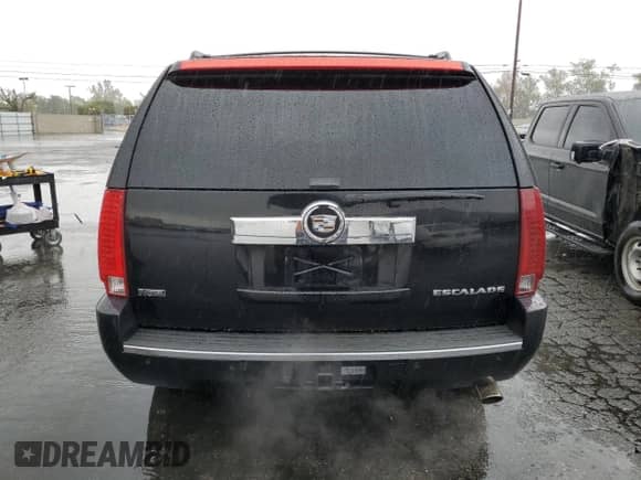 2011 Cadillac Escalade Premium с VIN 1GYS3CEF1BR152375, выставлен на аукционе Copart как лот 86407585 с пробегом 109 771 миль миль и Списание • Salvage title. История ставок и продаж доступна на DreamBid. Изображение 6.