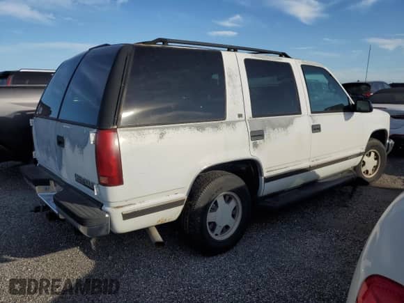 1996 Chevrolet Tahoe с VIN 1GNEC13R8TJ421533, выставлен на аукционе Copart как лот 76129824 с пробегом 190 015 миль миль и На запчасти • Non repairable. История ставок и продаж доступна на DreamBid. Изображение 3.