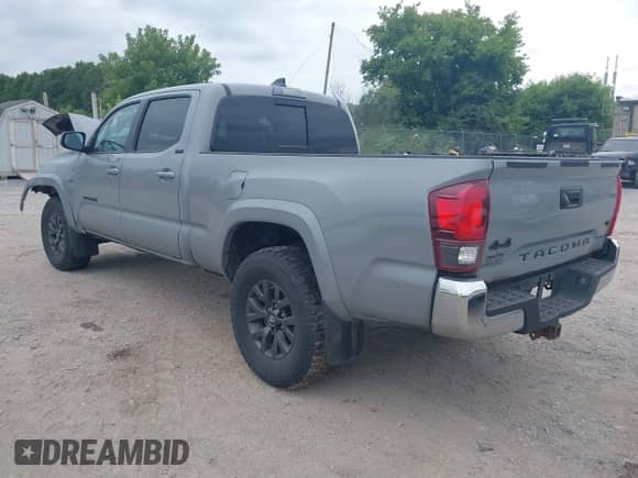 2021 Toyota Tacoma SR5 z VIN 3TMDZ5BN7MM106221, wystawiony jako IAAI lot #42827931 z przebiegiem 71 851 mil mil oraz . Historia ofert i sprzedaży dostępna na DreamBid. Obrazek 3.