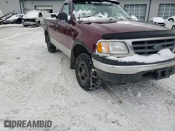 2003 Ford F-150 XL z VIN 1FTRF18233NB03504, wystawiony jako Copart lot #44250445 z przebiegiem 60 902 mil mil oraz Szkoda całkowita • Salvage title. Historia ofert i sprzedaży dostępna na DreamBid. Obrazek 11.
