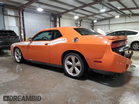 2014 Dodge Challenger R/T Plus с VIN 2C3CDYBT2EH154398, выставлен на аукционе Copart как лот 84259354 с пробегом 157 956 миль миль и Списание • Salvage title. История ставок и продаж доступна на DreamBid. Изображение 2.