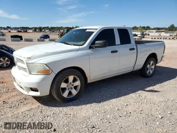 2012 Ram 1500 Express с VIN 1C6RD6FTXCS301424, выставлен на аукционе Copart как лот 82618115 с пробегом 213 492 миль миль и Чистый • Clean title. История ставок и продаж доступна на DreamBid. Изображение 1.
