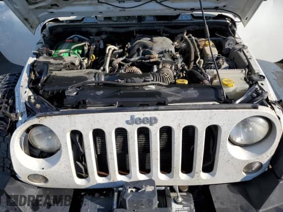 2015 Jeep Wrangler Rubicon z VIN 1C4BJWCG0FL695931, wystawiony jako Copart lot #70685724 z przebiegiem 72 740 mil mil oraz Szkoda całkowita • Salvage title. Historia ofert i sprzedaży dostępna na DreamBid. Obrazek 12.